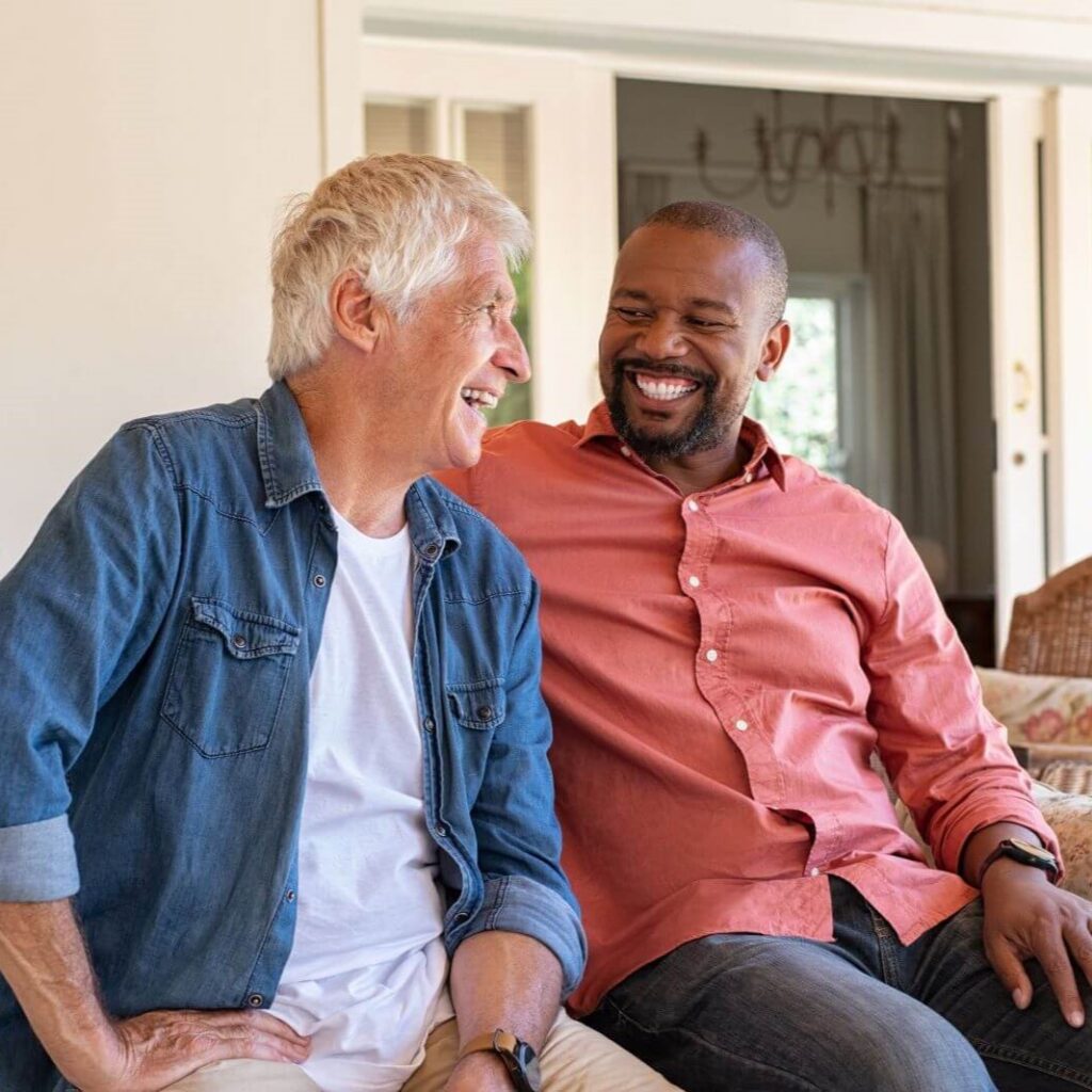 bigstock two friends talking while sitt 305308915 2